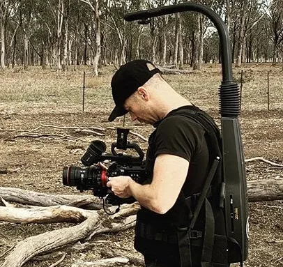 James Bristow filming with a gimbal rig on location
